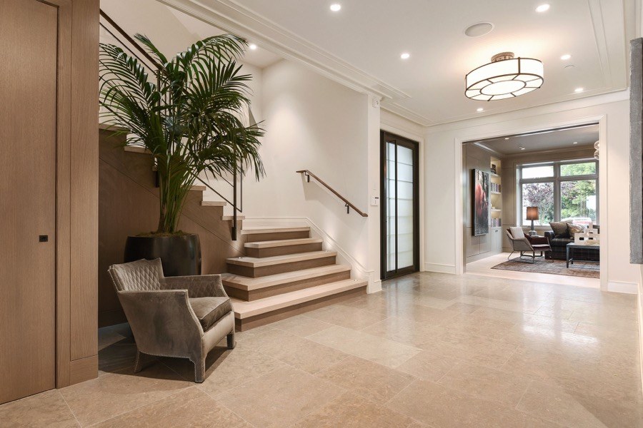 Broadway Entryway With Chair, Plant, Stairway And Living Room Access
