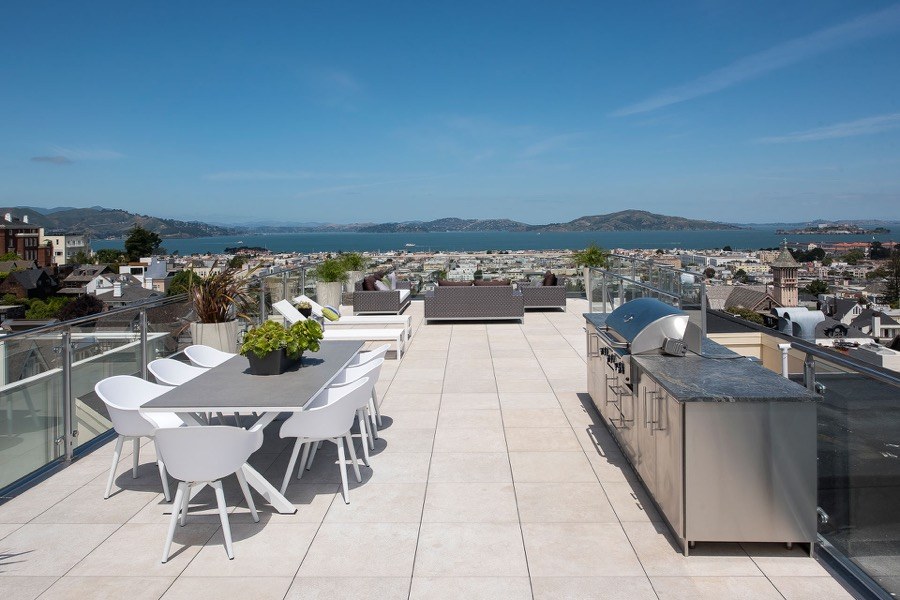 Broadway Rooftop Seating With Table And Chairs, Grill, And Unobstructed Views Of The Bay