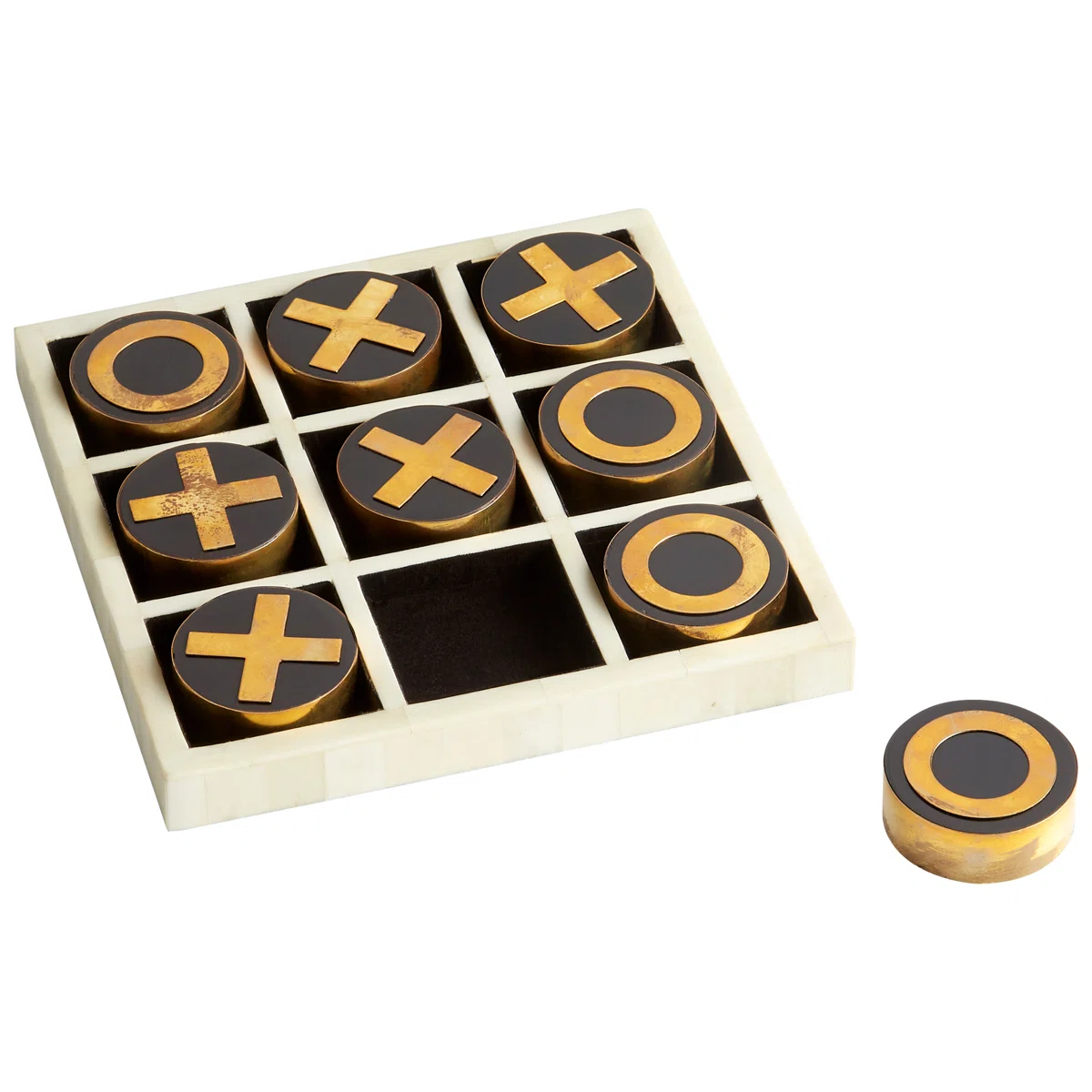 A tic-tac-toe game with a white board and gold and black X and O pieces. One O piece is placed outside the bottom right corner of the board. The center bottom slot on the board is empty.