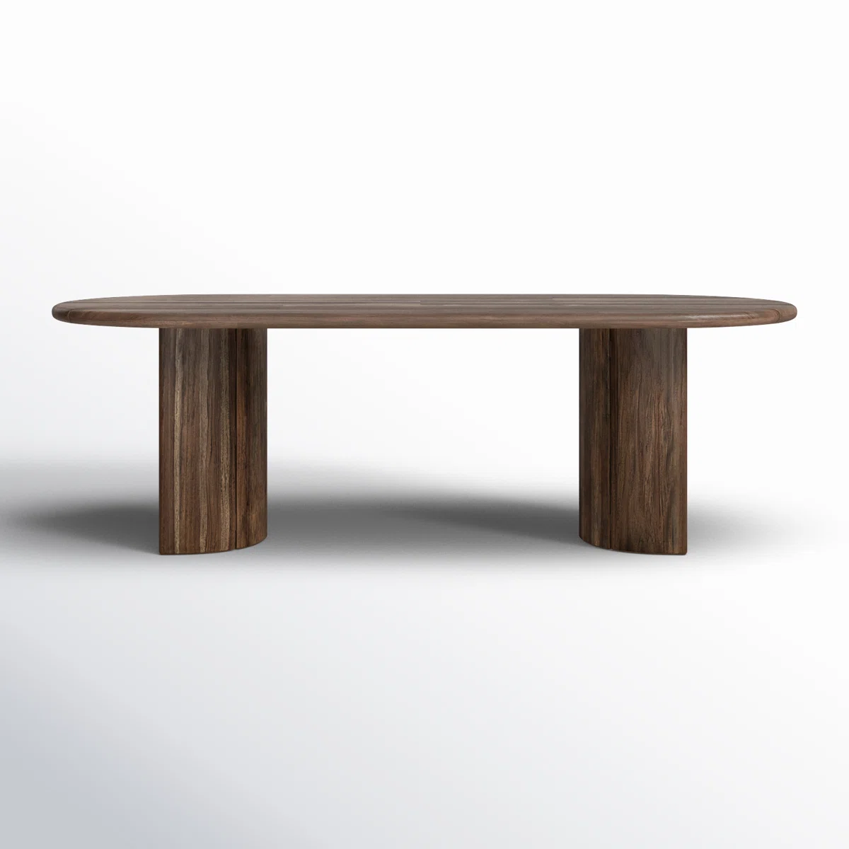 A modern wooden dining table with an oval top and two thick, curved pedestal legs, set against a plain white background.