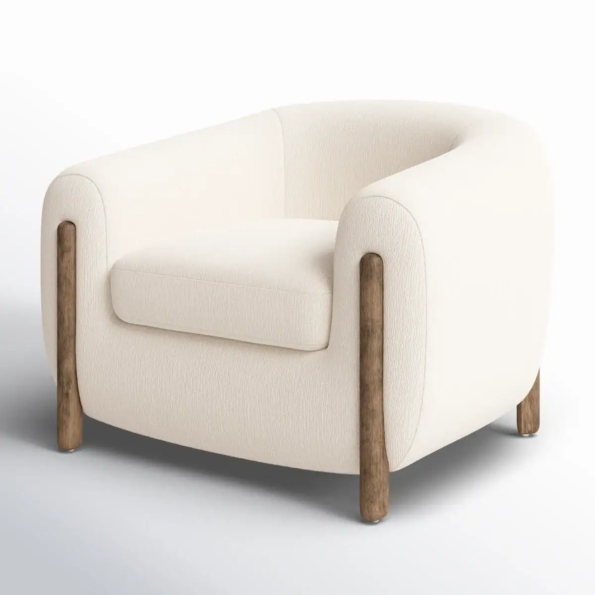 A modern, low-profile armchair with rounded edges, upholstered in off-white fabric. It features wooden cylindrical legs that extend partially up the sides, creating a stylish and cozy appearance.