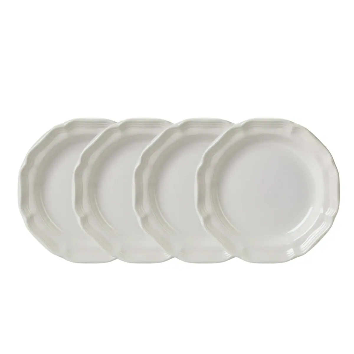 Four white scalloped-edge ceramic plates arranged in a slightly overlapping row, viewed from above on a plain white background.